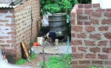 Watch this two hot Sri Lankan lady getting bath in outdoor