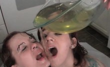 Weird lesbian teens diving in warm piss