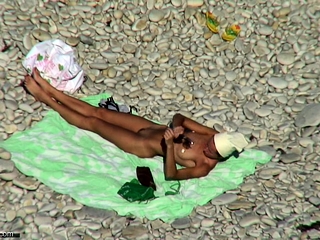 A Dude With A Hidden Camera Stalks A Chick At The Beach