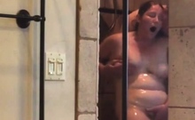 Husband gets his BBW girl off in shower passionately