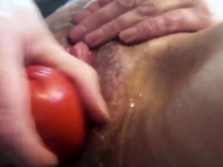 Cumslut fucks an aubergine