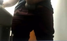 Brazilian Daddy Strokes His Big Uncut Cock at Work