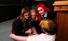 Uniform schoolbabes tugging classmate