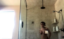 Amateur busty brunette masturbates and does hand job