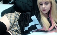 Tiny blonde teen porks her pussy with toys
