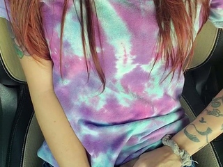 Outdoor solo masturbation scene with curly blonde