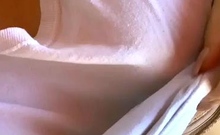 Busty curly brunette with big boobs fucks on couch