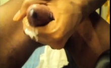 Black guy jacks off his big cock and cums hard